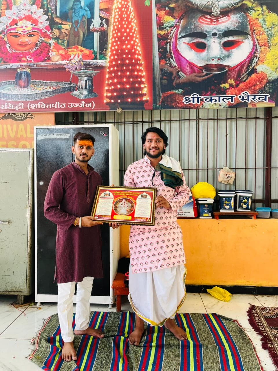 Devotee with Puja Certificate